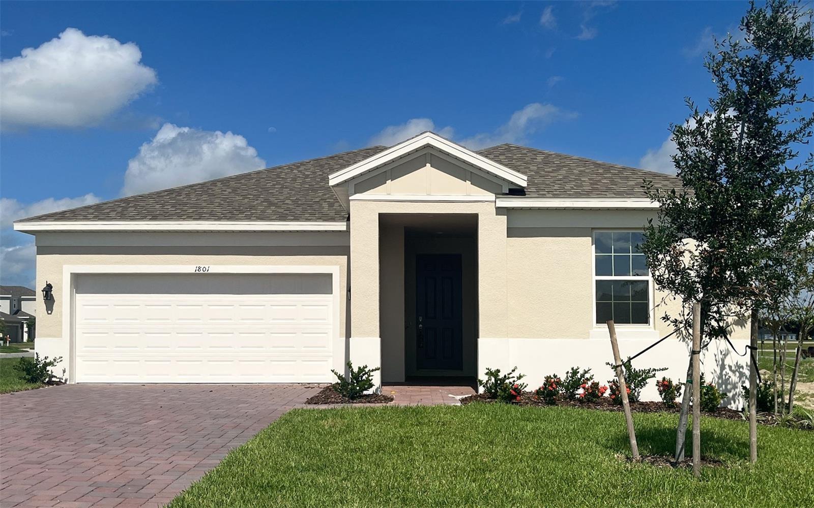 Be in your new home before the end of summer you can enjoy our resort style amenities including a pool, clubhouse, fitness center, walking trails, playgrounds, dog park and lakeside pier/pavilion. The Hayden is 2127 sq. ft and features 4 bedrooms plus a bonus area off the living room, 2 baths, walk in pantry and rainhead shower system with frameless glass enclosure in the primary bath. You won't be disappointed with the upgrades this home offers including beautiful wood laminate floors throughout the living areas and bedrooms. The baths and laundry feature upgraded tile. This home is situated on a corner lot with no rear neighbors close to the amenity center.
