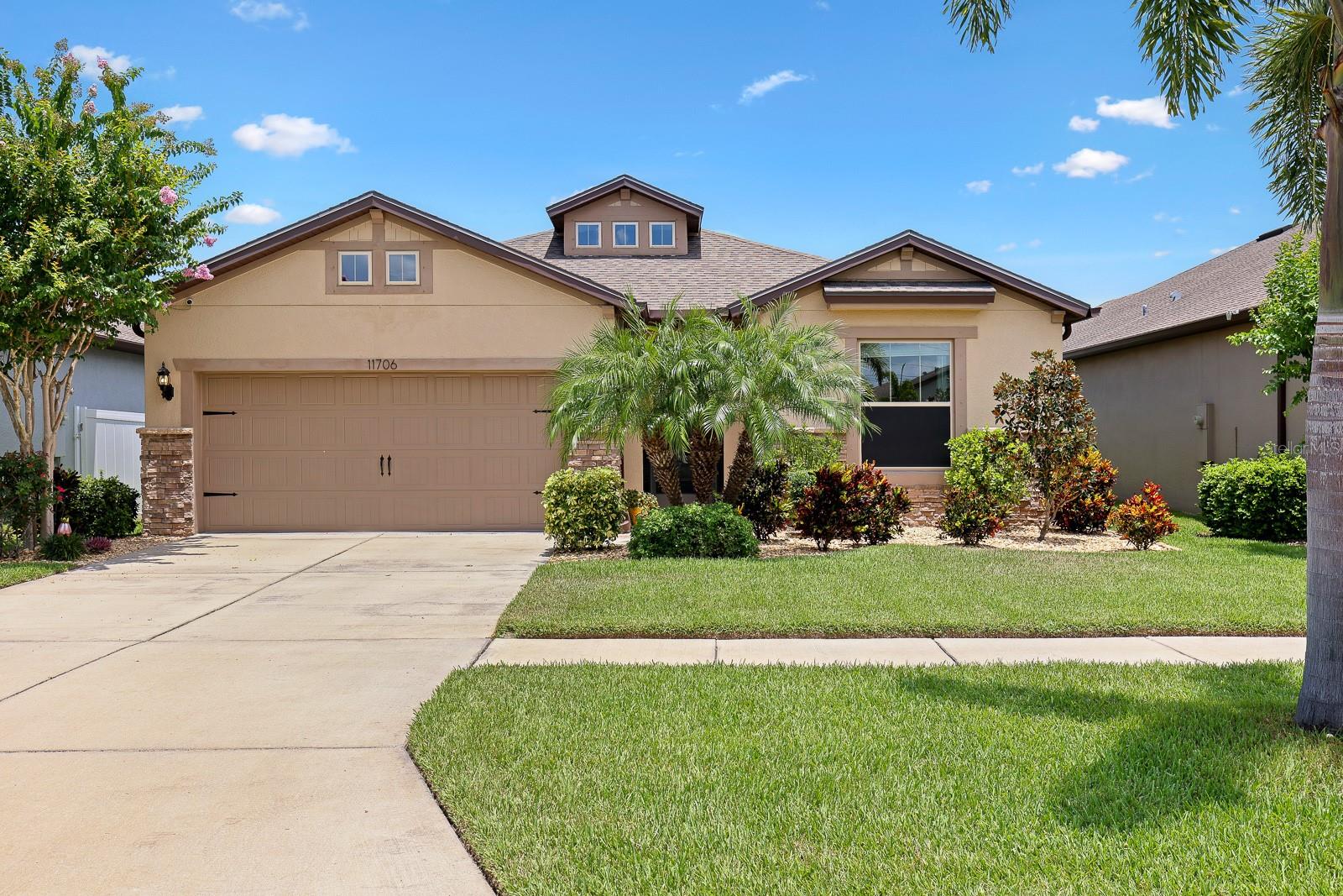 Situated in the sought-after South Fork community of Riverview, Florida, this meticulously maintained home offers the perfect blend of comfort, style, and functionality. Featuring 2 bedrooms, 2 full bathrooms, and a versatile den/office, this thoughtfully designed residence is packed with upgrades and move-in ready. A screened front patio welcomes you into the home, where a beautiful glass front door sets the tone for the stylish interior. Inside, you'll find a spacious open-concept layout enhanced by elegant crown molding throughout and thoughtfully selected finishes. The den/office is ideal for working from home or relaxing, featuring double glass French doors and updated laminate flooring installed in January 2022.
The heart of the home is the large, open kitchen which boasts a generous island, sleek stone countertops, and appliances that were recently updated in February 2023. The kitchen overlooks both the dining area and the living room, allowing for effortless entertaining and everyday living. From the living room, triple sliding glass doors open to the newly screened lanai with a sun shade, creating the perfect indoor-outdoor living space. Enjoy peaceful mornings and evenings in your private backyard oasis, complete with a tranquil water view and lush, updated landscaping that includes new palm trees, rocked flower beds, and refreshed plantings.
The split bedroom floor plan offers privacy and convenience. The primary suite, located at the rear of the home, features carpet that was replaced in July 2022 and a luxurious en-suite bathroom with an upgraded walk-in shower, dual sink vanity, private water closet, and a spacious walk-in closet with added shelving for optimal organization. The second bedroom, located at the front of the home, also features updated laminate flooring and has easy access to the second full bathroom, making it perfect for guests or family members.
A sizable laundry room adds to the home’s practicality with a dedicated folding station and added cabinetry for extra storage. Ceiling fans are installed in the bedrooms, office, and living room, ensuring comfort throughout the year. The two-car garage is equipped with built-in wood shelving and a workbench—perfect for hobbies or additional storage—and both front and rear rain gutters have been installed for added exterior maintenance protection. The entire interior of the home was freshly repainted in February 2022, providing a clean and updated feel throughout.
As part of the South Fork community, residents have access to a range of amenities including a community pool and recreation facilities. Ideally located just minutes from I-75, Highway 301, and an array of shopping and dining options, this home offers a peaceful, well-appointed retreat with easy access to everything Riverview has to offer.