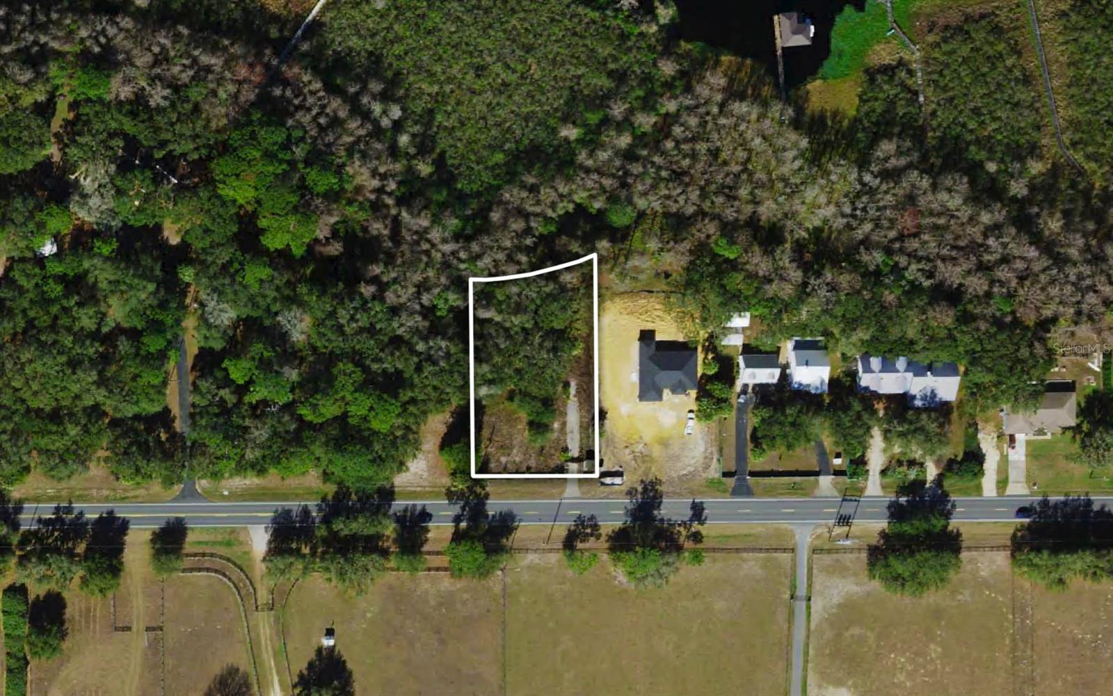 Bring your vision to life on this .54-acre semi-wooded parcel, ideally situated with direct road access on Dunnellon Road. Located in the growing town of Dunnellon, this property offers the perfect balance of quiet, natural surroundings and convenient access to everyday amenities. Known for its outdoor recreation options and scenic beauty, Dunnellon also features a historic downtown with local shops, dining, and small-town charm—all while being just a short drive from Ocala and other major hubs in Central Florida. This vacant lot is a true blank canvas, complete with a fully functional well and nearby electric to jump-start your build. The blend of mature trees and open space offers design flexibility, while the area’s ongoing development makes this a smart long-term investment. With no existing structures and access to one of Florida’s most beautiful waterways, the Withlacoochee River, this parcel delivers privacy, potential, and a lifestyle rooted in nature and community.