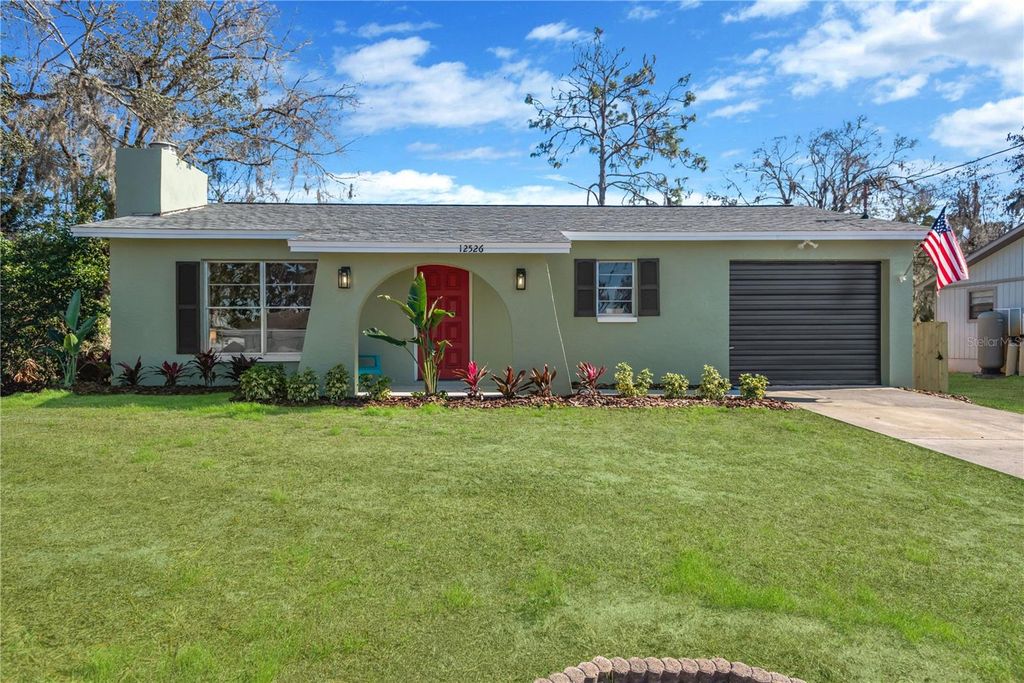 Photo of 12526 Lacey Drive, New Port Richey, FL 34654 (MLS # TB8480722)