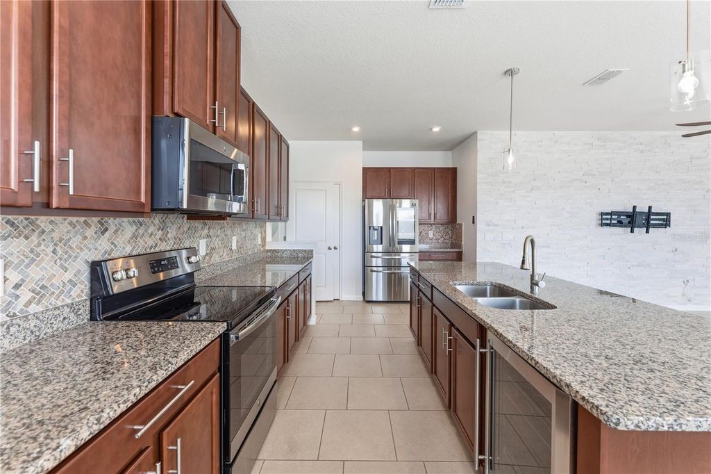 Photo of 2632 Pleasant Cypress Circle, Kissimmee, FL 34741 (MLS # O6387282)