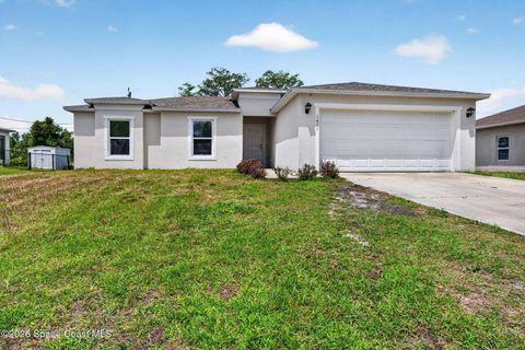 Photo of 1471 Palau Street SE, Palm Bay, FL 32909 (MLS # O6401187)