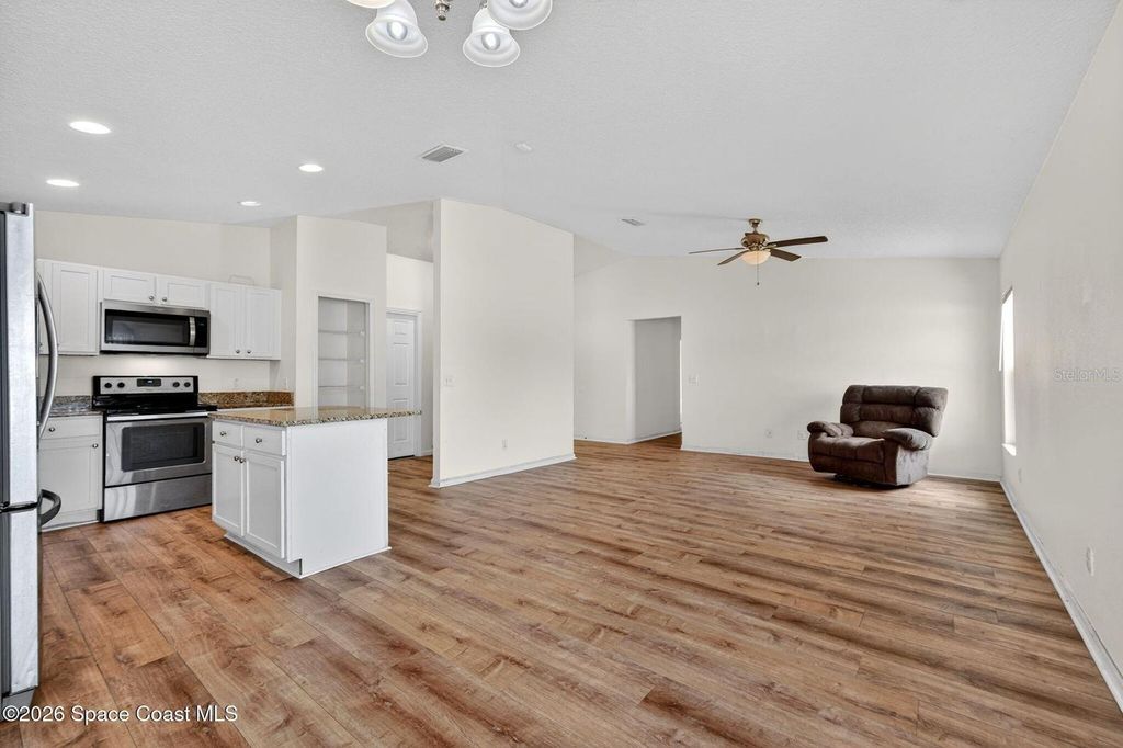 Photo of 1471 Palau Street SE, Palm Bay, FL 32909 (MLS # O6401187)