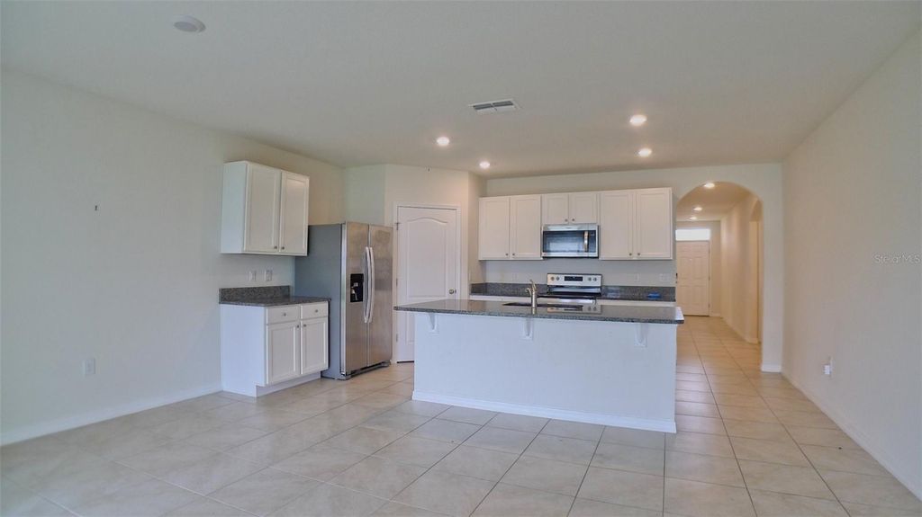 Photo of 3237 Country Walk Club Circle, Winter Haven, FL 33881 (MLS # TB8465809)