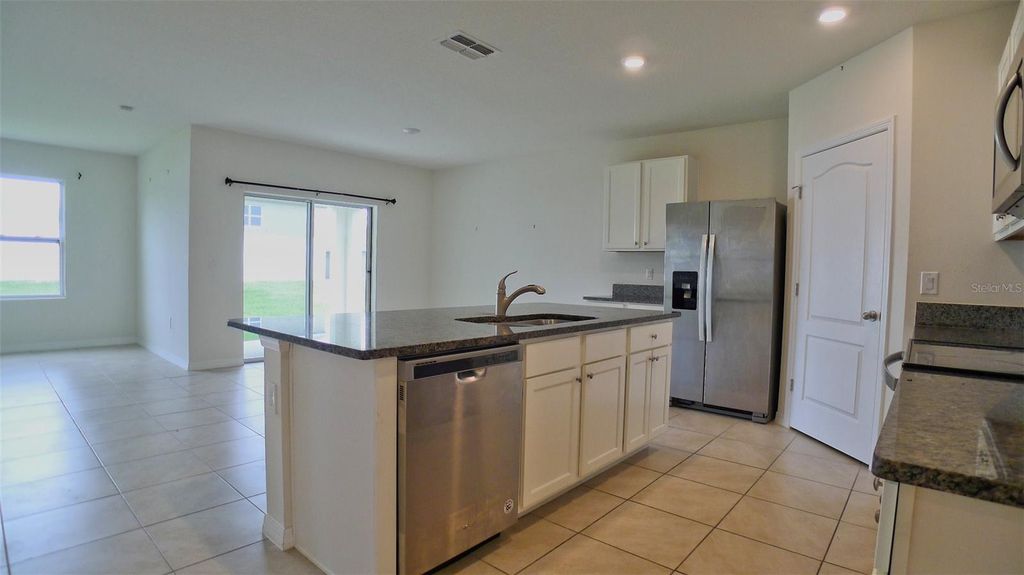 Photo of 3237 Country Walk Club Circle, Winter Haven, FL 33881 (MLS # TB8465809)