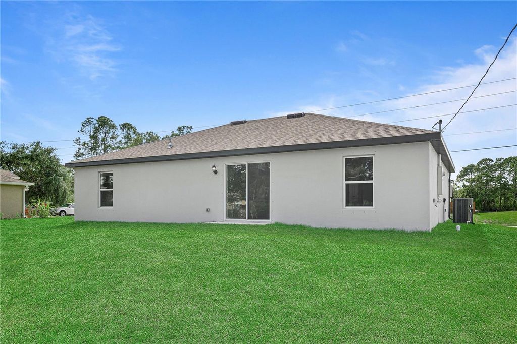 Photo of 1208 Wahneta Court, Poinciana, FL 34759 (MLS # TB8436461)