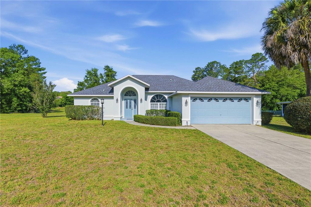 Photo of 10772 SW 53rd Circle, Ocala, FL 34476 (MLS # OM723952)