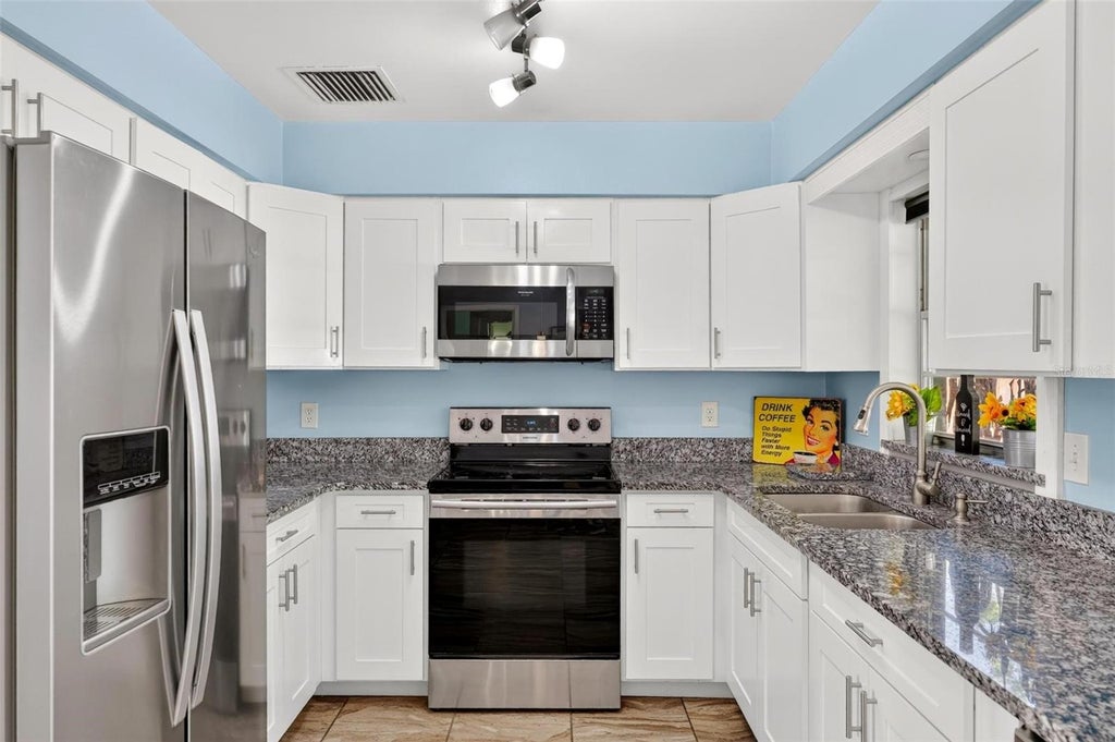 Photo of 7723 Danu Drive, Orlando, FL 32822 (MLS # O6443975)