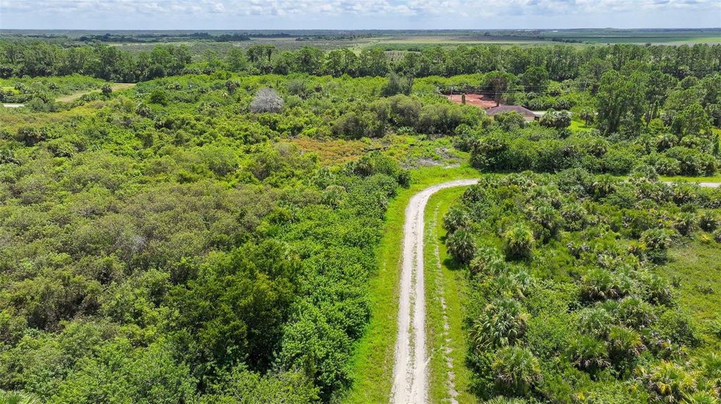 Photo of 1245 Cavalier Circle, Lehigh Acres, FL 33974 (MLS # W7877851)