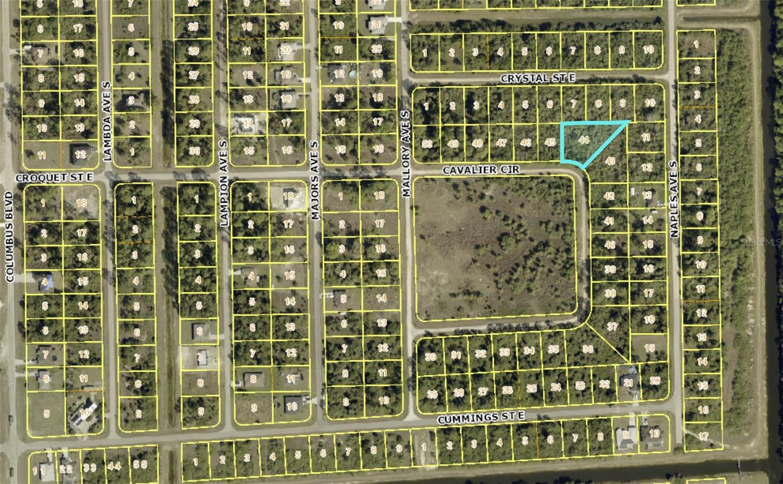 Biggest lot for sale in the neighborhood!!!!! Discover the perfect place to build your dream home on this spacious 0.45-acre lot, ideally located on a quiet bend in the highly sought-after area of Lehigh Acres. Tucked away for added privacy yet just minutes from local amenities, this prime piece of land offers the best of both worlds—peaceful surroundings with convenient access to shopping, schools, and main roadways. Enjoy the flexibility to design your ideal home with plenty of space for a pool, workshop, or garden oasis. Whether you're looking to build now or invest for the future, this lot is a rare opportunity in a growing community.