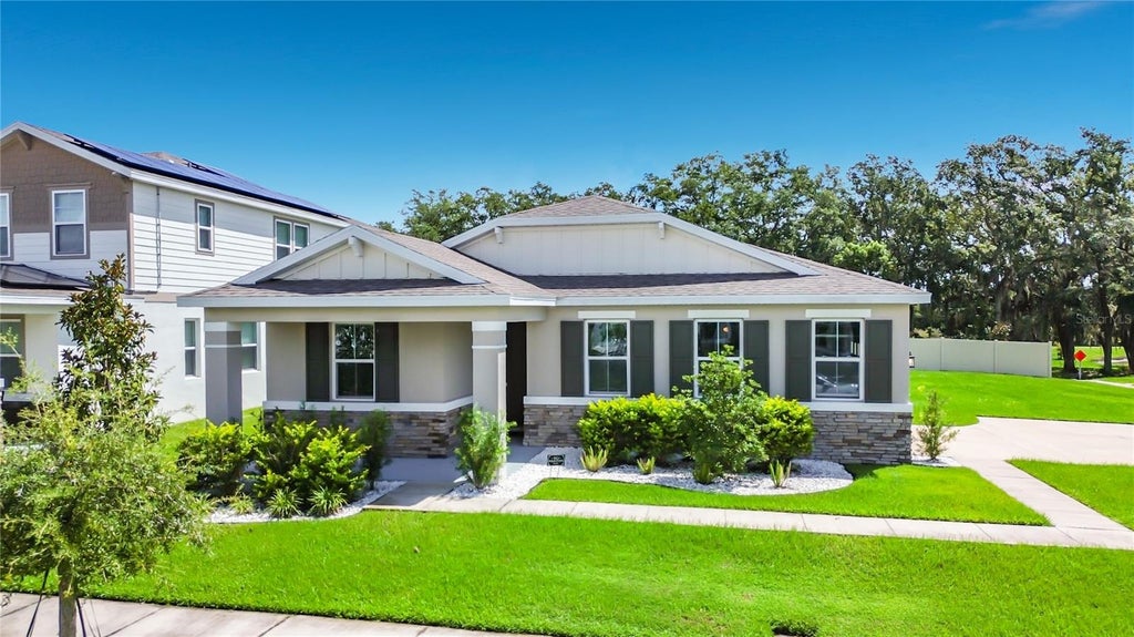 Photo of 1525 Erin Breeze Lane, Kissimmee, FL 34744 (MLS # O6438881)