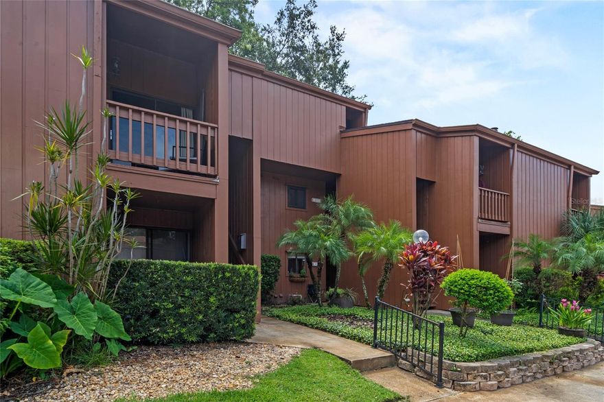 Welcome to the One Thousand Oaks Private Gated Condo Community in downtown Orlando! This condo is perfectly positioned in an area with lovely scenery, close to the heart of downtown Orlando. This second-floor condo boasts soaring ceilings and Engineered hardwood floors throughout the main level.   The main floor spacious master bedroom includes a walk-in closet, ensuite master bath, and slider doors to the private balcony. The kitchen has solid wood cabinets with soft-close drawers, Quartz counters, a tile backsplash, a breakfast bar, and stainless steel appliances. The kitchen overlooks the dining room. Light and bright living room with soaring ceilings is a great place for entertaining. Upstairs, find 2 additional bedrooms and a secondary bath. Community amenities include tennis courts, a clubhouse, and a sizable community pool.