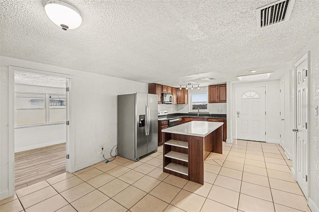 Photo of 9031 Tree Valley Circle, Tampa, FL 33615 (MLS # TB8470247)