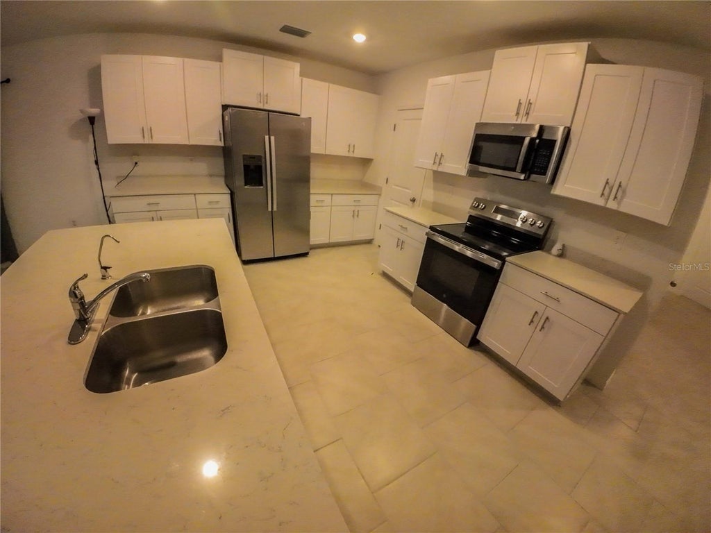 Photo of 12442 Amber Waves Road, Lehigh Acres, FL 33974 (MLS # C7530479)