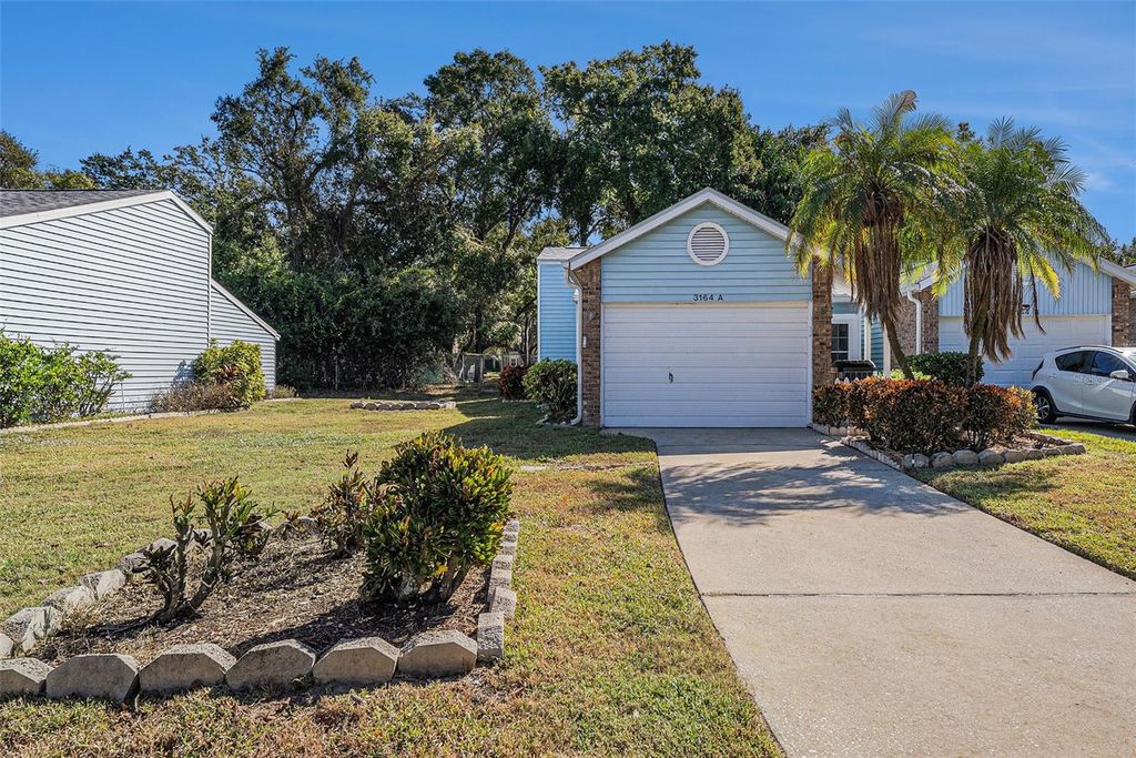 Photo of 3164 Claremont Place #A, Palm Harbor, FL 34683 (MLS # TB8447216)