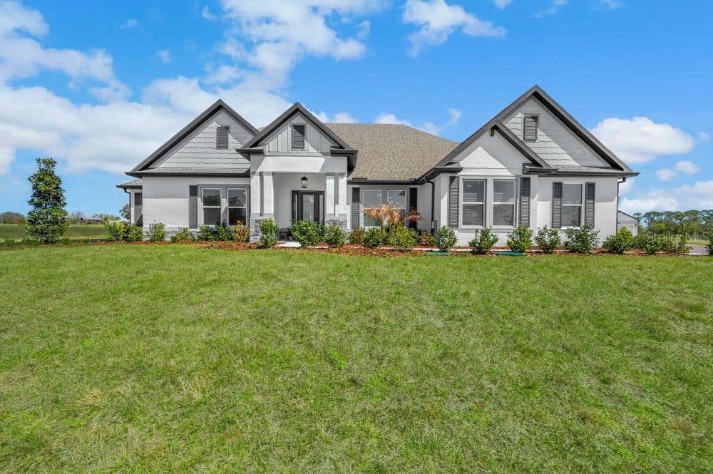Photo of 3841 Saddle Hill Trail, Fruitland Park, FL 34731 (MLS # TB8535540)