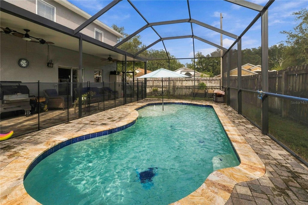 Photo of 1103 Soaring Osprey Way, Valrico, FL 33594 (MLS # TB8555176)