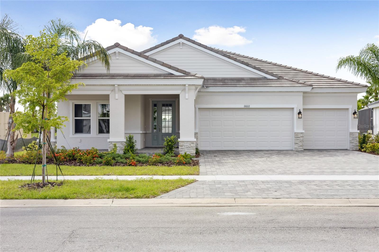 Biscayne I -
This Biscayne I is Ready Now! This home features Sonoma Painted Linen cabinets, Frost Whte MSI Quartz countertops, and Pride Plus LVP flooring. The Biscayne offers a wonderful open living floorplan, providing seclusion for the owner’s retreat and secondary bedrooms. The heart of this home is the combined grand room, gourmet kitchen, and casual dining, all with access to the outdoor living with its extended covered lanai. Adding to its allure, this Biscayne I home boasts impact glass for enhanced protection and peace of mind, along with a private pool, your personal oasis for relaxation and enjoyment. The 12-foot ceilings in the foyer, grand room, and kitchen complement the open design, along with tray ceilings throughout the main living areas. The owner’s retreat features walk-in closets and a luxurious master bath with a deluxe walk-in shower.
Wellen Park is a vibrant and thriving community located in Venice, FL, offering a modern and connected lifestyle. Situated amidst picturesque landscapes and natural beauty, this master-planned community provides an exceptional living experience for residents of all ages. With an emphasis on outdoor living, Wellen Park provides an extensive network of trails, parks, and green spaces, encouraging an active and healthy lifestyle. Residents can enjoy activities such as walking, jogging, cycling, and picnicking in the beautiful surroundings.