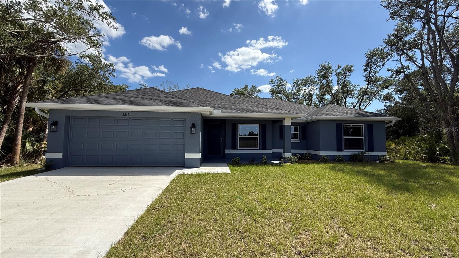 Under Construction. Discover the perfect blend of comfort and style in this amazing 1540 sq ft home in North Port, FL. Boasting 3 generously sized bedrooms and 2 well-appointed bathrooms, this property offers ample space for relaxation and convenience. The 2-car garage provides secure parking and additional storage. The open floor plan enhances the sense of space, creating a bright and airy atmosphere ideal for both entertaining and everyday living. Enjoy modern conveniences with stainless steel appliances, including a stove, microwave, and dishwasher. The kitchen and bathrooms feature elegant granite countertops, adding a touch of luxury to the home. Located in a nice neighborhood, this move-in-ready home is right across the street from Cranberry Elementary School and close to local amenities and parks. Don’t miss the opportunity to make this inviting home yours! Schedule your showing today!