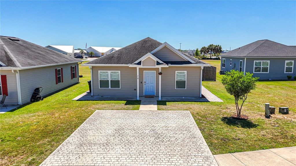 Photo of 219 Mesa Street NW, Live Oak, FL 32064 (MLS # OM723087)