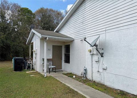 Photo of 918 Loquat Tree Road, Orlando, FL 32811 (MLS # O6384063)