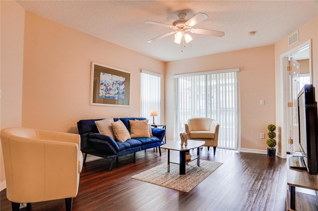 Photo of 8812 Grand Palms Circle #A, Kissimmee, FL 34747 (MLS # O6447972)