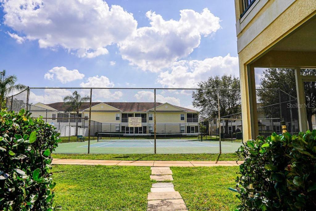 Photo of 8812 Grand Palms Circle #A, Kissimmee, FL 34747 (MLS # O6447972)