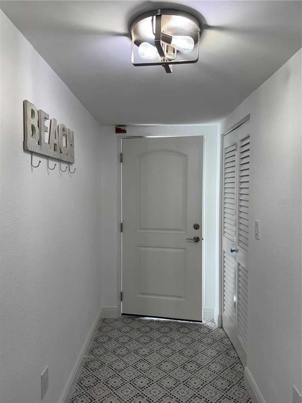 Photo of 298 Skiff Point #103, Clearwater Beach, FL 33767 (MLS # TB8446781)