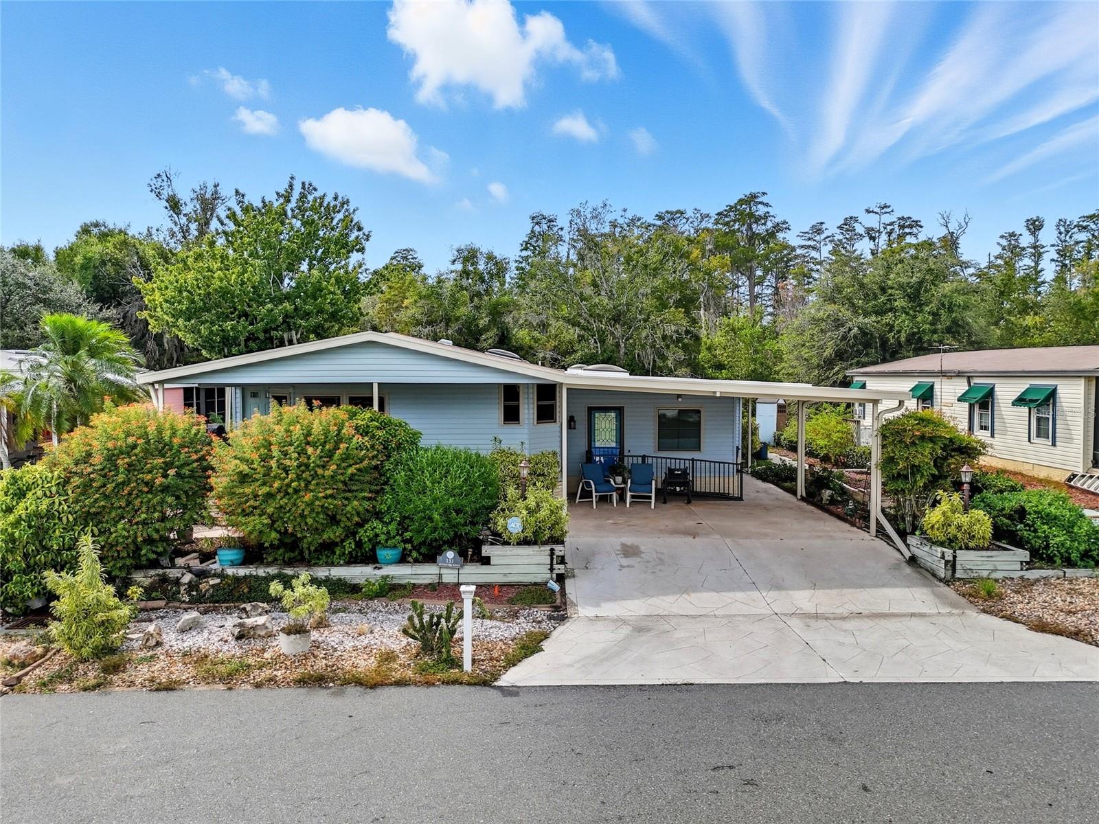 Welcome to 151 Jackson Park, a spacious and inviting manufactured home located in a quiet 55+ golf community. This charming home offers plenty of room to relax and enjoy, featuring two comfortable living rooms, two bedrooms, and two full bathrooms.
The kitchen includes a small island and opens nicely into the living areas, creating a comfortable flow for everyday living. There’s also a built-in laundry room, a dedicated office area, and a huge oversized storage room giving you all the space you need to stay organized.
At the back of the home, you’ll find an extra oversized bonus room with peaceful views of the water and surrounding trees. With no rear neighbors, you’ll love the privacy and tranquility this setting provides.
This home combines comfort, space, and a beautiful natural backdrop, perfect for enjoying the relaxed lifestyle this wonderful 55+ golf community offers.