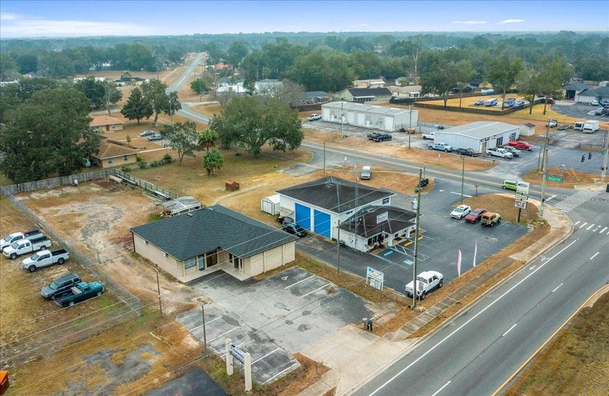 Incredible opportunity to rent a 2,420 sq ft building zoned B4 on nearly half an acre right on Baseline Road in Ocala. The property offers not only convenience but a prime location to operate and promote your business with large signage on a very high traffic road. This building features three individual addresses as well as three private entrances. The private back storage yard is completely fenced with barbed wire topped chain link fence and the building is equipped with several cameras offering a high level of security. 2025 was a year of many upgrades to the building including a new roof, HVAC, luxury vinyl flooring throughout as well as fresh paint, trim and bathroom fixtures, giving this building a fresh look sure to suit any company.