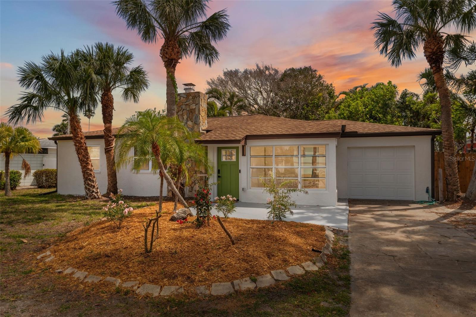Fully renovated and perfectly situated in the exclusive community of Belleair Beach, this coastal gem offers the ultimate Florida lifestyle just steps from the sugar-white sands and sparkling waters of the Gulf of Mexico. Set on a generous 0.19-acre lot, this home has been meticulously updated inside and out—giving you peace of mind and modern comfort in a highly desirable beachside neighborhood. Enjoy the laid-back charm of Belleair Beach with easy access to both the Gulf and the Intracoastal Waterway, plus nearby parks, a boat ramp, community center, basketball and tennis courts, and a variety of beachside cafés and restaurants. Inside this 2 bedroom + bonus room 1 and a half bathroom home, no detail has been overlooked. A full professional remediation down to the studs was followed by brand new framing, drywall, and insulation. The entire HVAC system, including ducts and vents, is new—along with a NEST thermostat and tankless water heater for maximum efficiency. Electrical and plumbing systems have been fully updated, complemented by new hardwood flooring, interior doors, fresh paint, and designer light fixtures throughout. The kitchen is a showstopper with all-new cabinetry, quartz countertops, sleek Samsung appliances, and upgraded plumbing fixtures. The exterior has been equally enhanced with a new roof (2020), seamless gutters, fresh paint, and a spacious new deck ideal for relaxing or entertaining. A hurricane-rated garage door, new exterior doors, updated light fixtures, a video doorbell, and a freshly sealed chimney with a new flue and cage add both style and security. And as a bonus, enjoy complimentary pest control through September 2025. Whether you're savoring sunsets, spotting dolphins, or enjoying endless water activities, this home is your gateway to the best of Florida coastal living. Don’t miss your chance to own this beautifully restored Belleair Beach retreat!