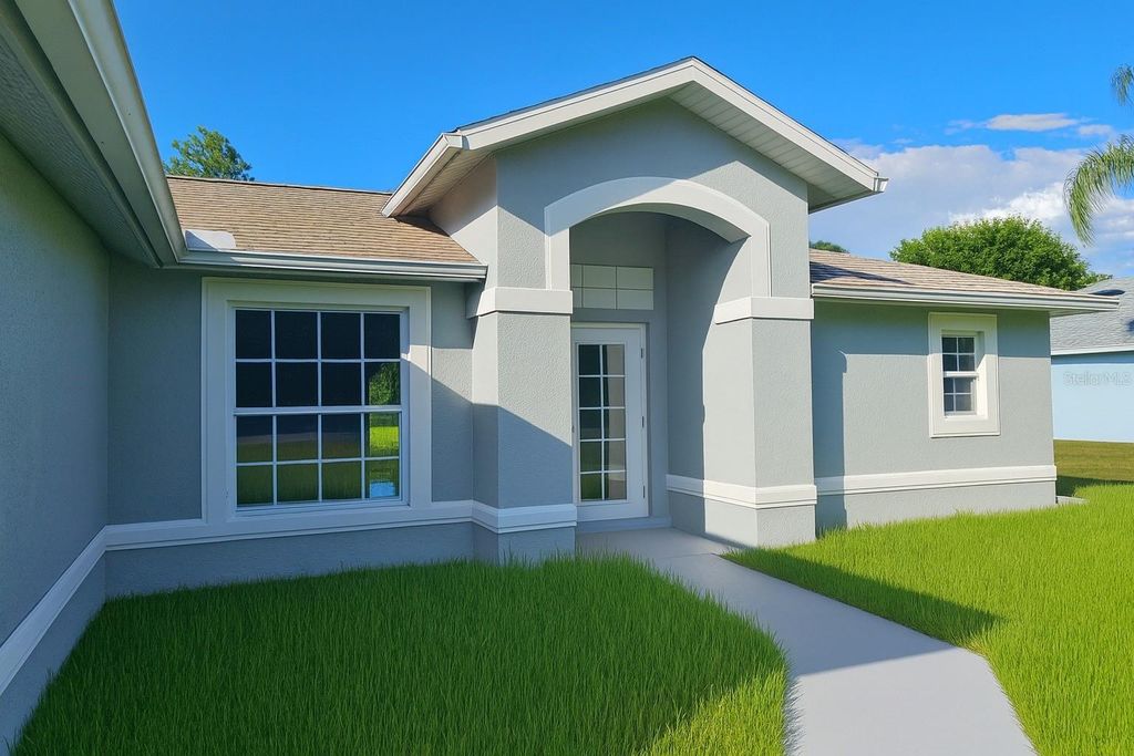 Photo of 116 Ridgemont Drive, Lehigh Acres, FL 33972 (MLS # C7516531)