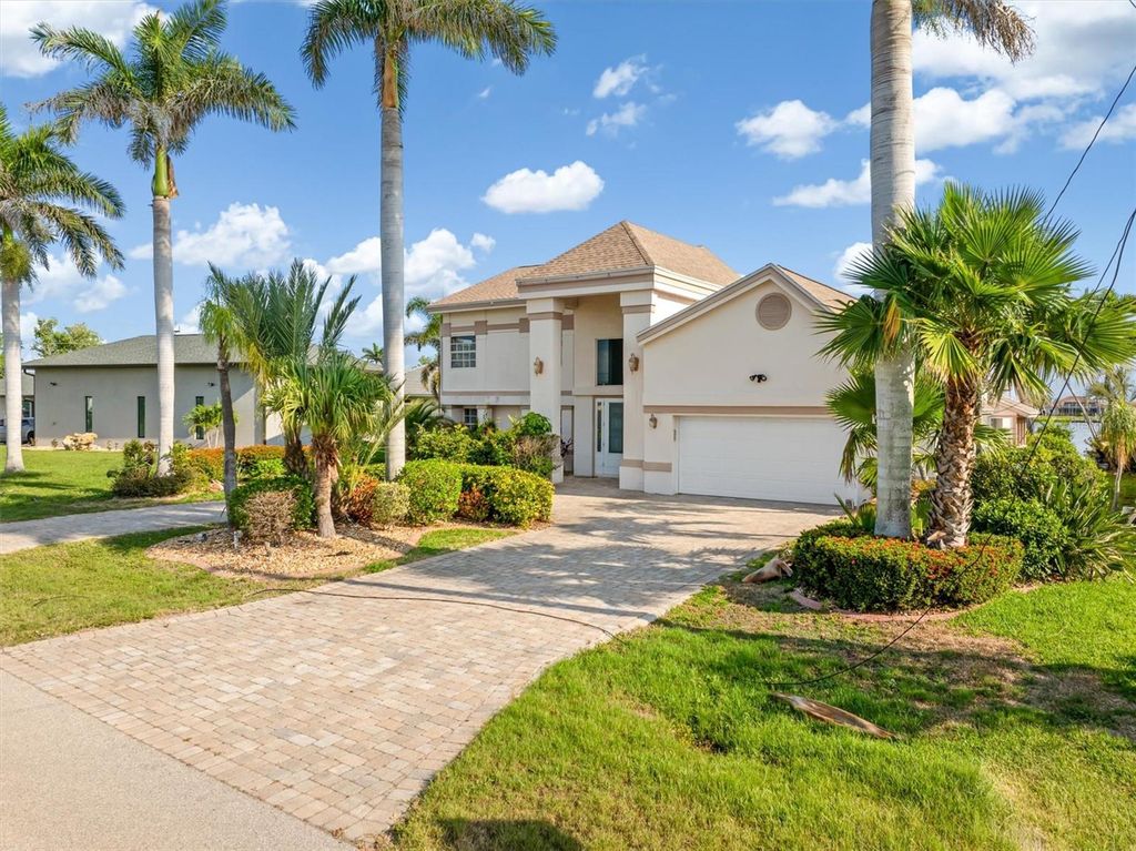 Photo of 719 SW 51st Terrace, Cape Coral, FL 33914 (MLS # C7510368)