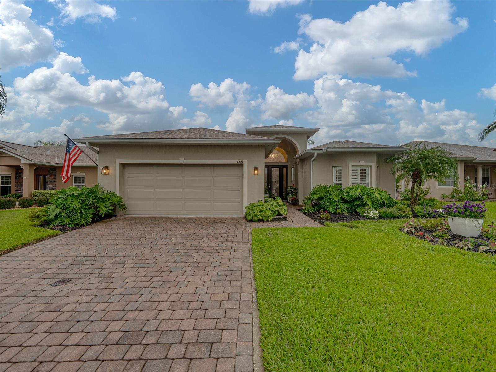Resort-Style Living in Lake Ashton's 55+ Community Golf, Pools & More! The CDD bond is paid in full! This move-in ready 3-bedroom, 2-bath home features a stunning decorative glass entry door with twin sidelights and an arched transom window that welcomes you into the grand foyer filled with natural light. The open floor plan features ceramic tile throughout the main living areas, beautiful crown molding throughout, plantation shutters and updated light fixtures and fans. The kitchen is designed for both function and style, boasting 42” cabinets with crown molding, granite countertops, and upgraded stainless-steel appliances. Plus a closet pantry and inside laundry with additional storage space. The open living and dining areas flow seamlessly, making this home perfect for entertaining.
The primary suite offers a true retreat with double entry doors, two walk-in closets, and an en-suite bath with dual vanities, a garden tub, and an oversized shower. The two additional bedrooms are located near the front of the house and one can easily be used for an office, den or craft room to suite your needs. Enjoy year-round Florida living in the enclosed Florida room with tile floors, or step outside to the pavered patio for relaxing or grilling.
Recent updates add peace of mind: roof (2021), A/C (2021), hot water heater (2022), and garage door (2025).
Residents of Lake Ashton enjoy a vibrant lifestyle with 2 18 hole golf courses, indoor & outdoor pools with hot tubs, tennis, pickleball, racketball, fitness centers, and endless social activities. In addition there is a restaurant inside the clubhouse and a Pro Shop and the Eagles Nest for casual eats & drinks. Don’t miss this opportunity to own a beautiful, well-maintained home in one of Central Florida’s most sought-after 55+ communities!