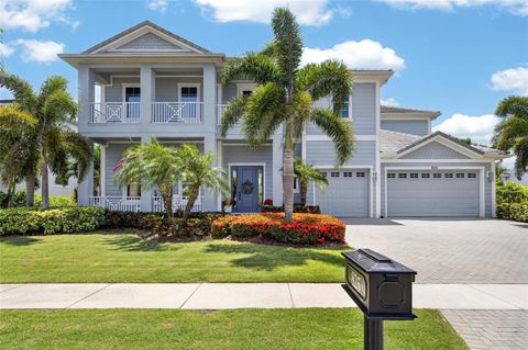 Photo of 825 Manns Harbor Drive, Apollo Beach, FL 33572 (MLS # TB8520847)