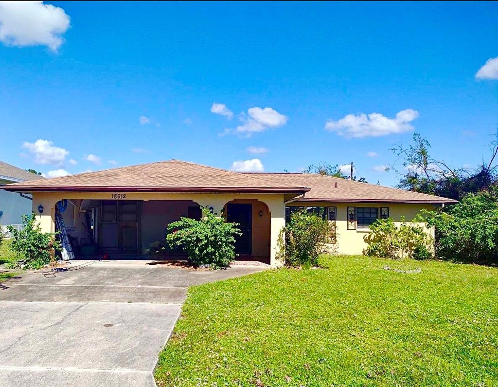 Photo of 18512 Blair Avenue, Port Charlotte, FL 33948 (MLS # C7515846)