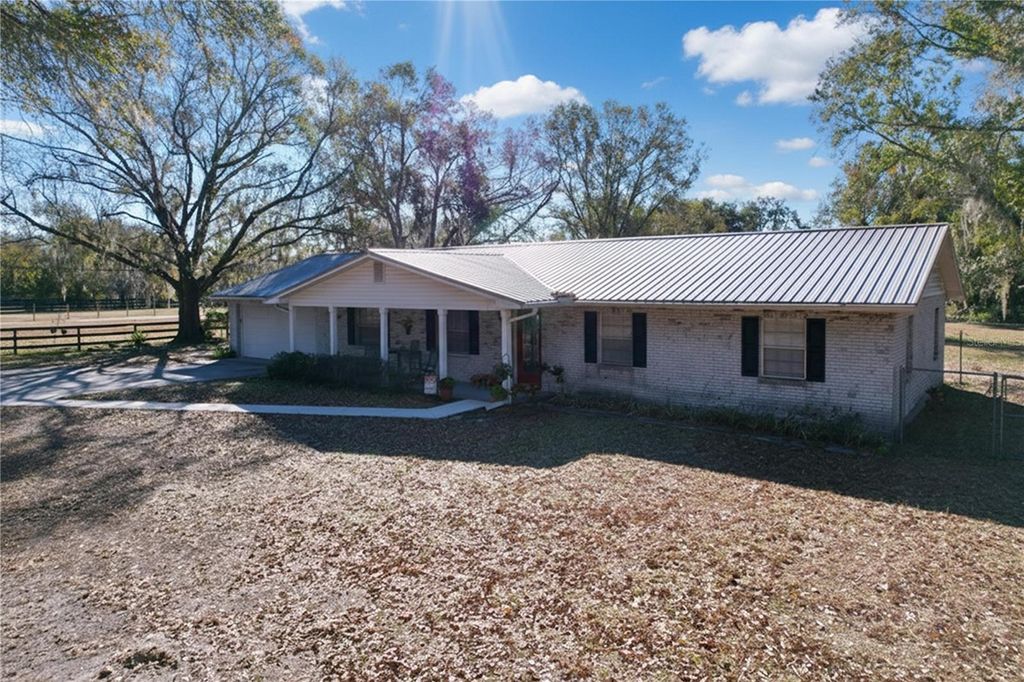 Photo of 1303 E Trapnell Road, Plant City, FL 33566 (MLS # TB8470581)