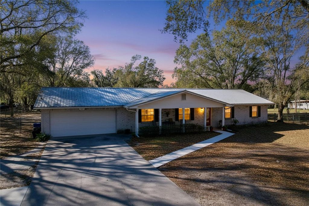 Photo of 1303 E Trapnell Road, Plant City, FL 33566 (MLS # TB8470581)