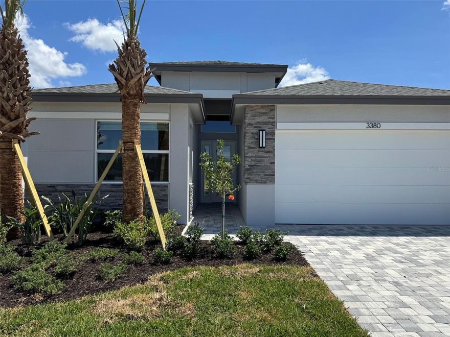 One or more photo(s) has been virtually staged. Welcome to Valencia Ridge — the gold standard of Wesley Chapel’s premier 55+ resort-style living on Florida’s breathtaking West Coast. Designed for active adults who desire an extraordinary lifestyle, Valencia Ridge offers the perfect blend of luxury, excitement, and everyday elegance.  Ideally located in the heart of Wesley Chapel’s thriving and vibrant corridor, residents enjoy convenient access to upscale shopping at The Shops at Wiregrass, fine dining, entertainment, and world-class healthcare facilities. At the center of the community is a spectacular resort-style clubhouse featuring sparkling pools, a state-of-the-art fitness center, tennis and pickleball courts, on-site dining, and an endless social calendar filled with activities, clubs, and events that make every day feel like a luxury vacation. This stunning Jasmine model spec home is beautifully appointed and move-in ready, offering the perfect opportunity to begin living the Florida lifestyle you’ve been dreaming about. The floor plan has smart design elements for those who love to entertain including the open-concept layout and versatile den. This home features three bedrooms, 3 baths, a large den, and a 2-car garage. Experience the “Wow” factor as you step through the elegant glass entry door into a sprawling, open-concept great room illuminated by designer lighting, ceiling fans and recessed lighting as well as upscale flooring. The kitchen is a chef’s dream with a showstopper kitchen featuring a sleek slide-in gas range, stainless steel chimney hood, gorgeous quartz countertops and backsplash, a built-in microwave unit and chic under-cabinet lighting. This move-in ready home conveniently includes a refrigerator, washer, dryer, 2" faux-wood blind window treatments. This spec home has many high-performance finishes including the fully equipped laundry room, pre-plumbing for a water softener, and a patio summer kitchen pre-plumbed. We’ve taken the stress out of moving as this home is designed by Interior decorators who possess a rare blend of artistic vision and technical precision. Every room is finished with a luxurious, upgraded interior paint color. This home embraces an earth-tone palette that radiates warmth and sophistication. There is a $21,696 builder incentive which is already applied to the list price of this spec home.*Disclaimer that some photos are of the Jasmine MODEL HOME.