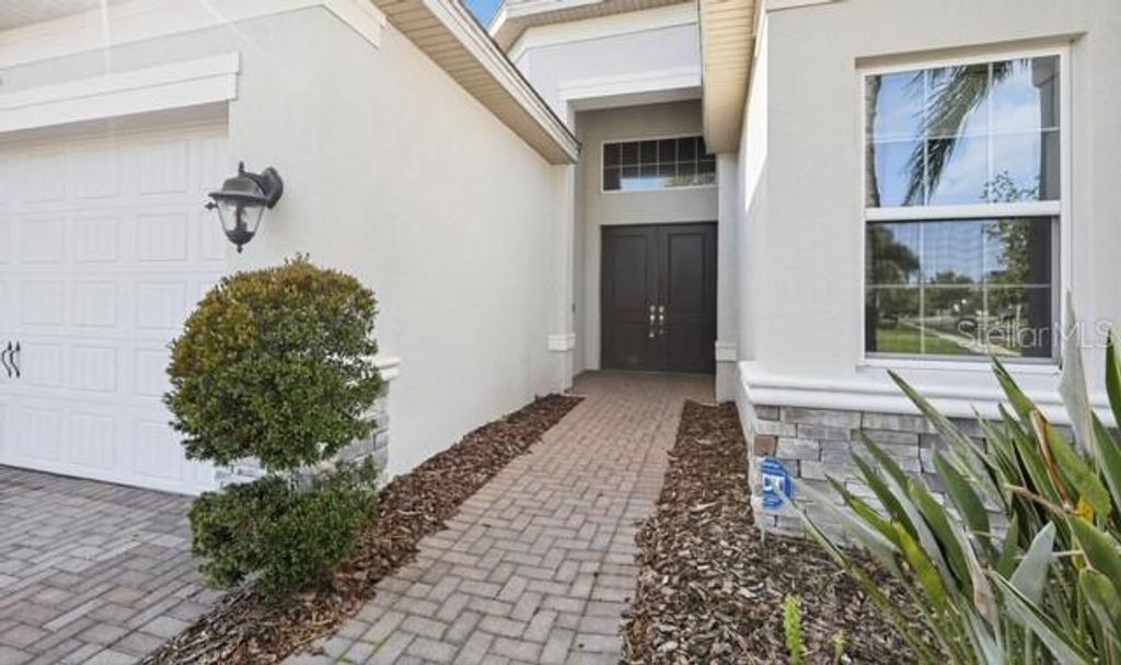 Photo of 2471 Coco Palm Circle, Wesley Chapel, FL 33543 (MLS # TB8425693)