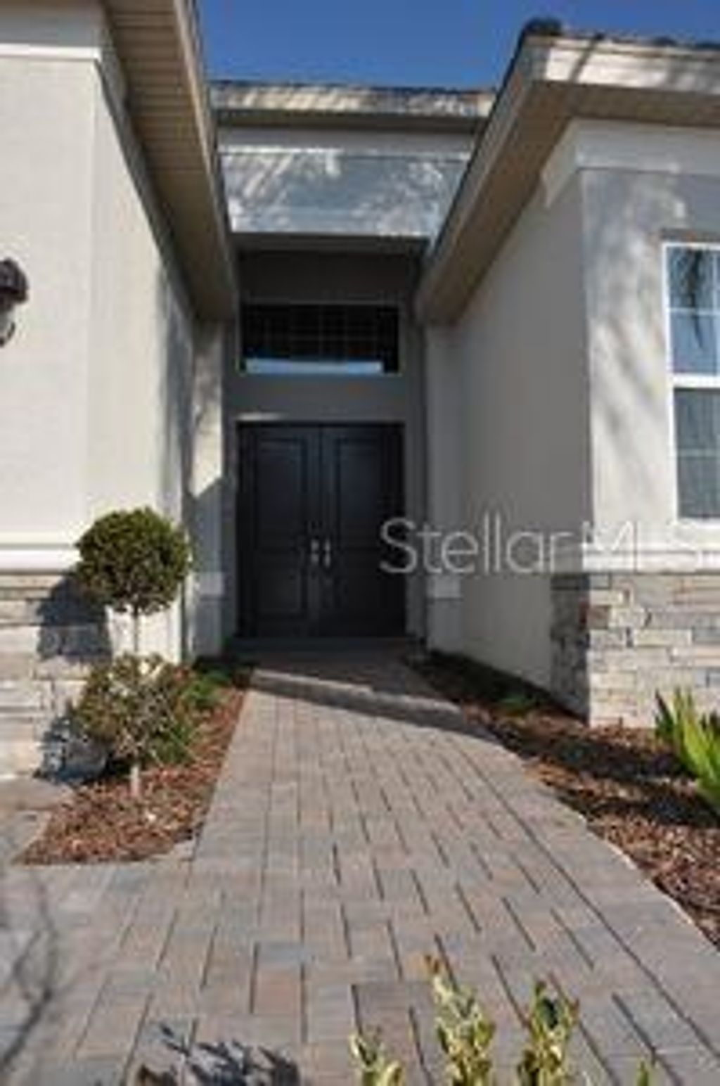 Photo of 2471 Coco Palm Circle, Wesley Chapel, FL 33543 (MLS # TB8425693)