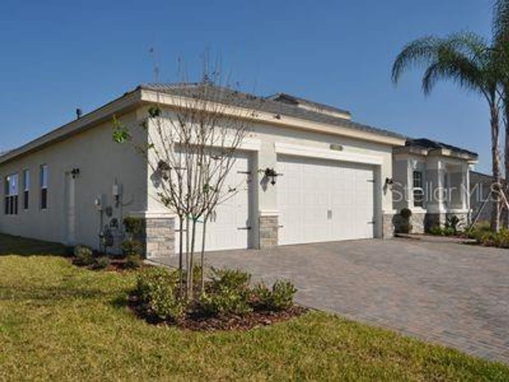Photo of 2471 Coco Palm Circle, Wesley Chapel, FL 33543 (MLS # TB8425693)