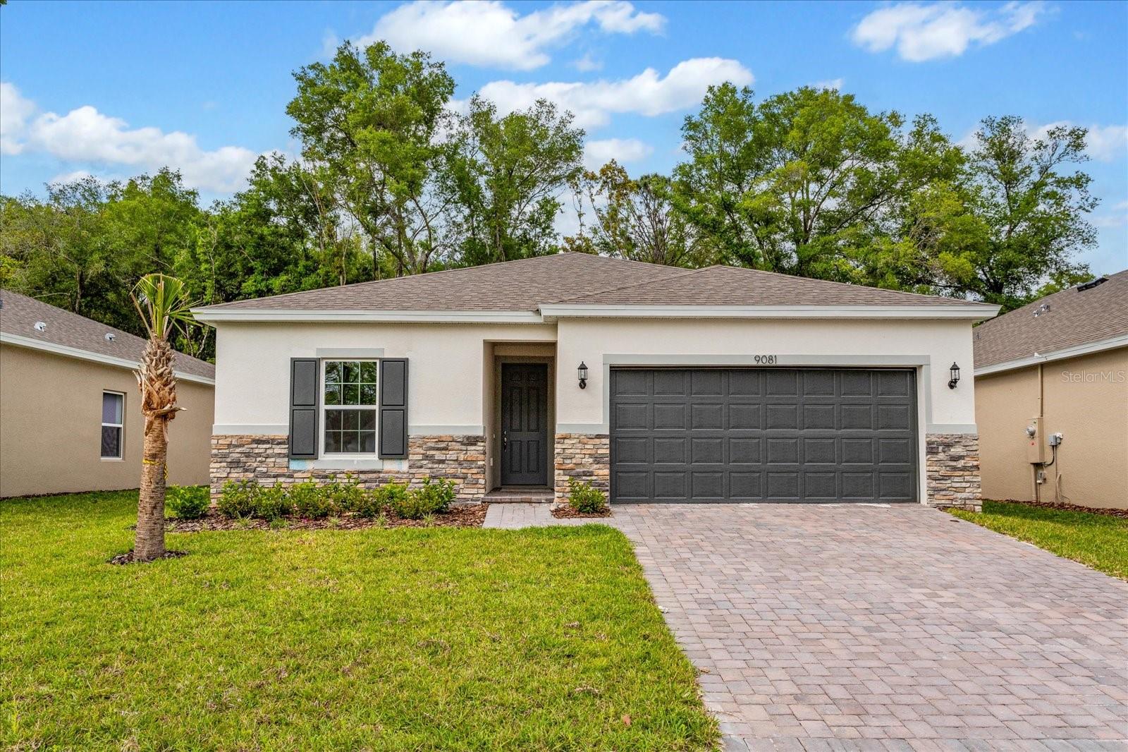 Under Construction. Welcome to this stunning Dream Finders Bradley floorplan, located in the highly sought-after community of Willowbrook near a beautiful golf course in Winter Haven, FL. This spacious 4-bedroom, 2-bath home offers 1,589 square feet of living space and boasts excellent curb appeal due to its impressive elevation.
Inside, you'll find gorgeous Gray cabinets complemented by sleek quartz countertops in the kitchen, creating a modern, bright atmosphere. Tile flooring runs throughout the wet and common areas, offering durability and easy maintenance. The open layout is perfect for family gatherings and entertaining guests.
