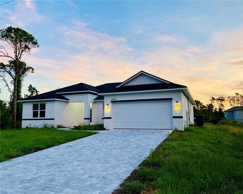 Photo of 14358 Mcfarland Avenue, Port Charlotte, FL 33981 (MLS # O6364605)