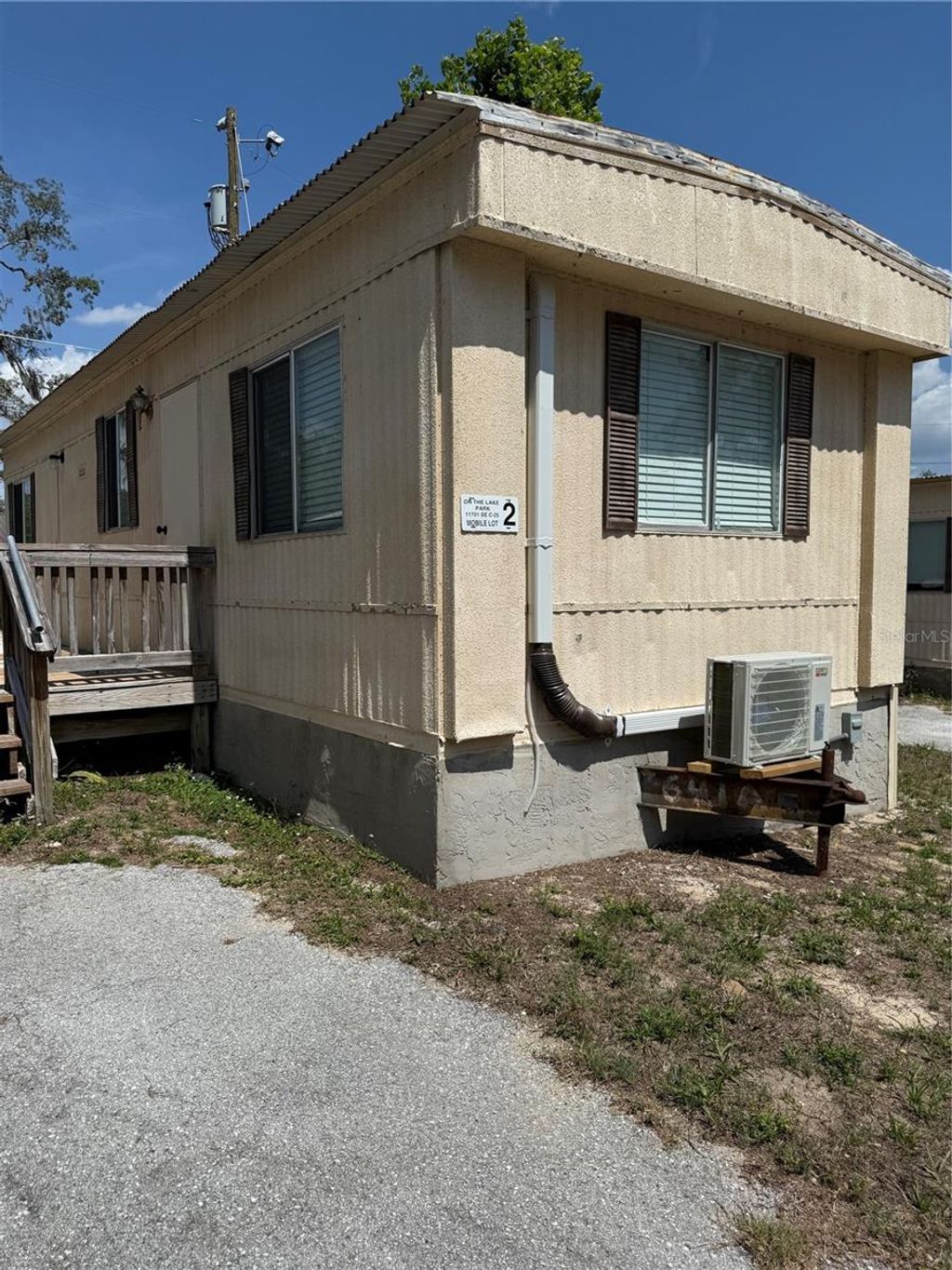 Photo of 11649 E Highway 25 #2, Ocklawaha, FL 32179 (MLS # OM702276)
