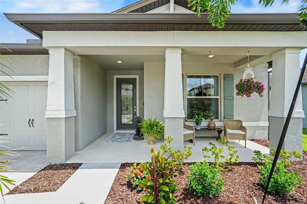 Photo of 7756 Yale Harbor Drive, Wesley Chapel, FL 33545 (MLS # TB8537769)