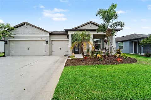 Photo of 7756 Yale Harbor Drive, Wesley Chapel, FL 33545 (MLS # TB8537769)