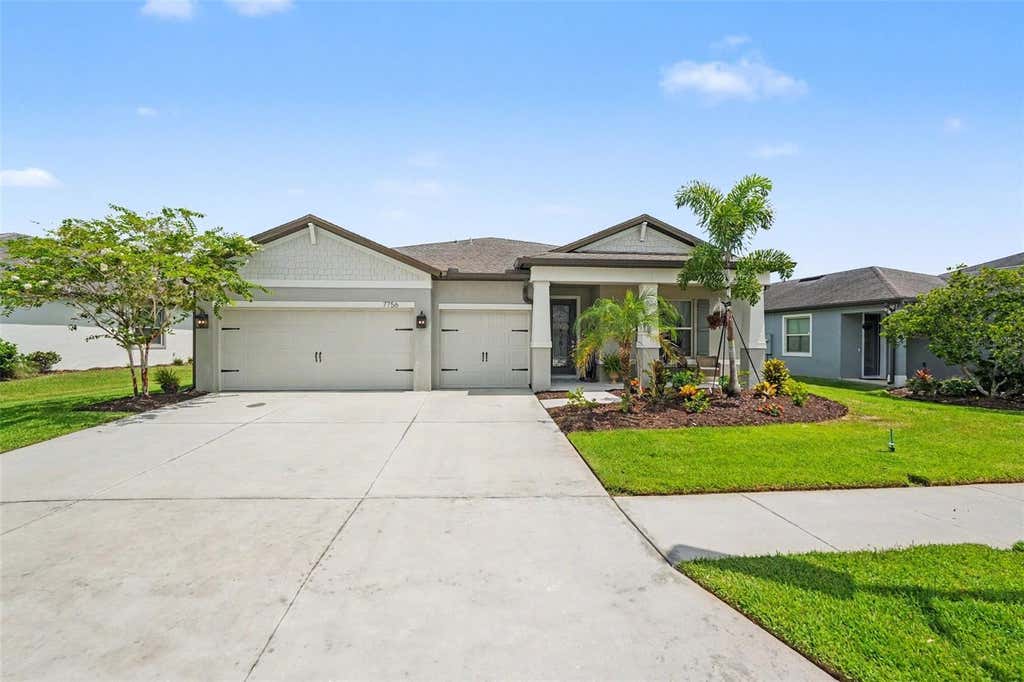 Photo of 7756 Yale Harbor Drive, Wesley Chapel, FL 33545 (MLS # TB8537769)