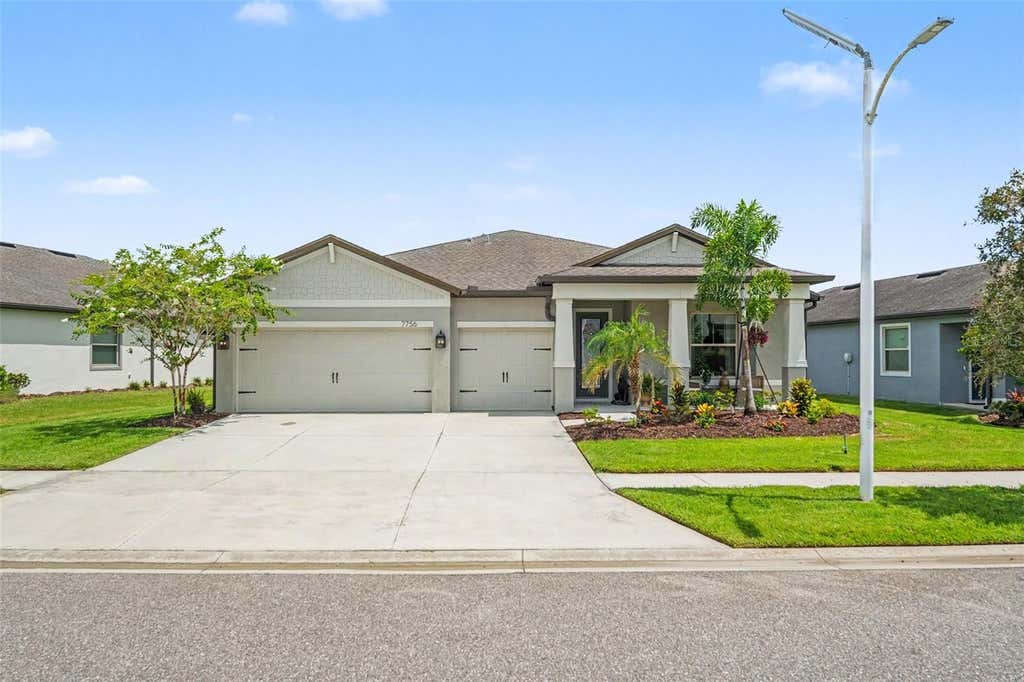Photo of 7756 Yale Harbor Drive, Wesley Chapel, FL 33545 (MLS # TB8537769)