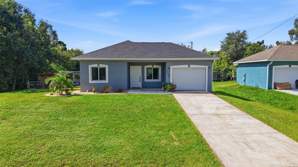 Photo of 11265 3rd Avenue, Punta Gorda, FL 33955 (MLS # O6449746)